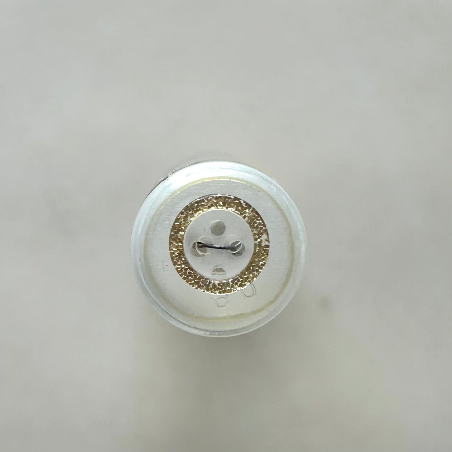 Buttons:  Clear Button with Gold Sparkle Trim 2-Hole Button 14mm